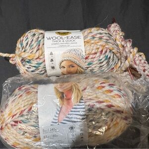 Lion Brand Wool-Ease yarn Hudson Bay.  Comes with 2 circular knitting needles